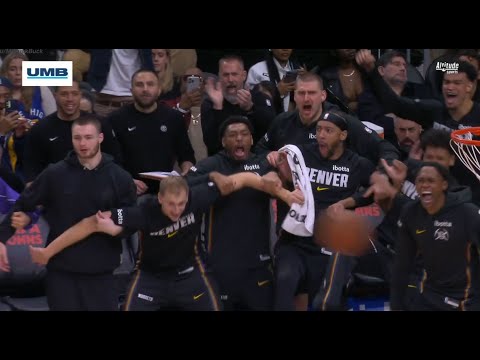 Jonas Valančiūnas with a powerful dunk that gets everyone on the Nuggets bench hyped, even Jokic
