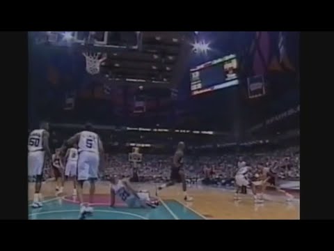 Karl Malone knocks down Tim Duncan, 2001-02.