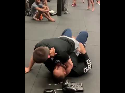 Khabib Nurmagomedov trying his hardest to submit Daniel Cormier