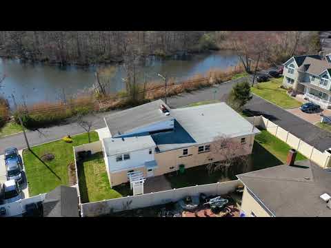 52 Lake Dr, Copiague, NY 11726