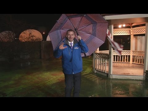 Andy Parker fights the wind while on the Weather Outside