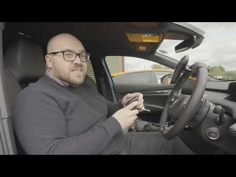 Hand Controlled Car Demonstration: Steering-Wheel Mounted Adaptations