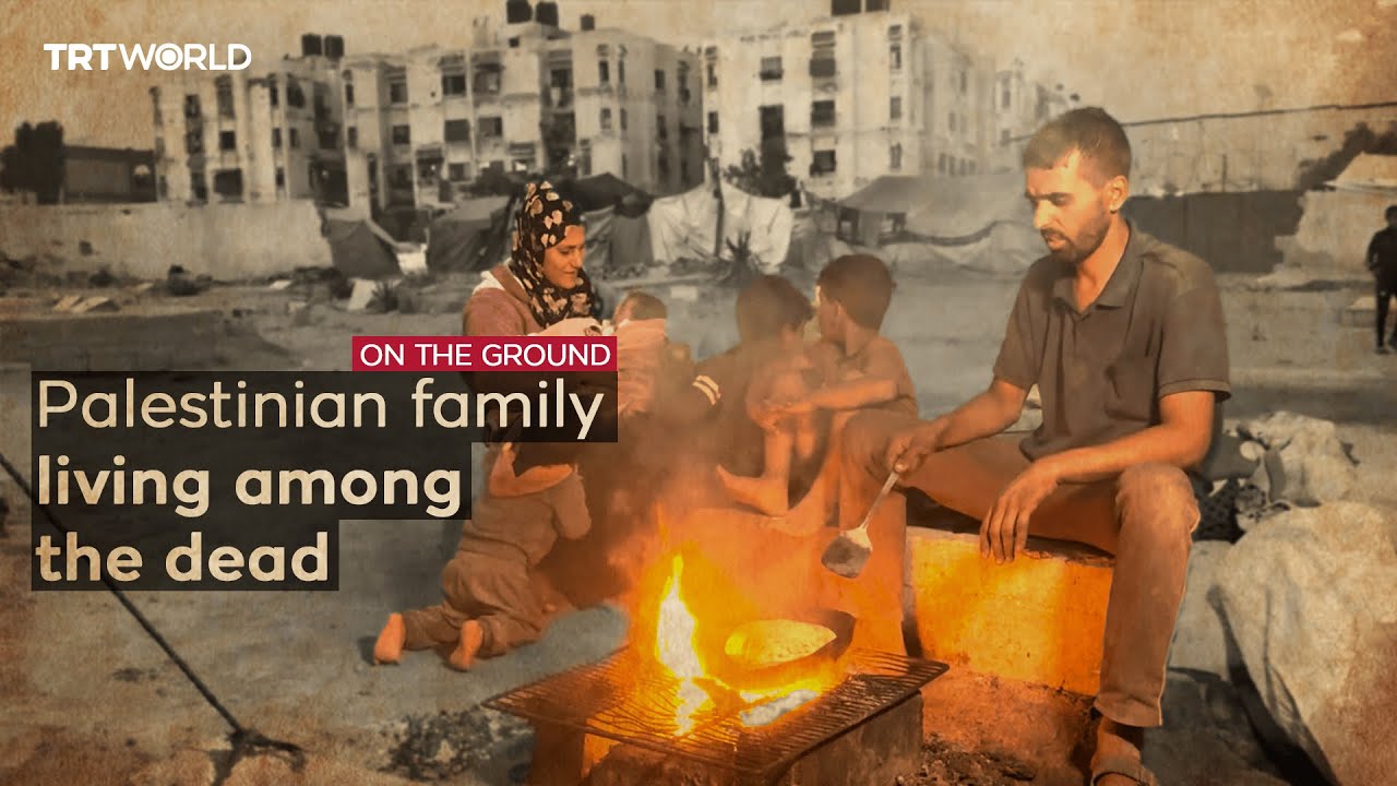 Displaced Palestinian family use cemetery as their home