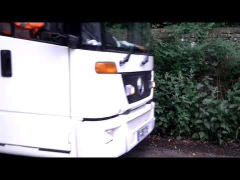 Mercedes Econic Faun Variopress Driving Off