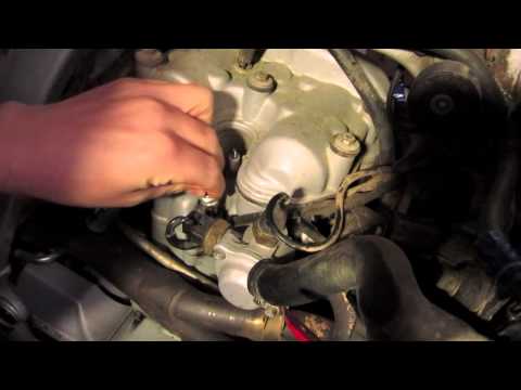 Putting DR8EIX NGK Iridium spark lugs in my BMW F650 Classic Funduro motorcycle