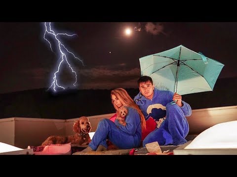 SPENDING THE NIGHT ON OUR ROOF IN A STORM!