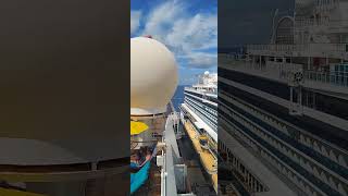 Carnival Sunshine in and out of Port 