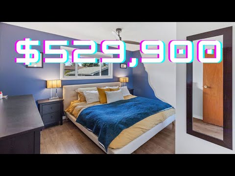 Inside a cute & updated $529,900 home in Acadia, Calgary.