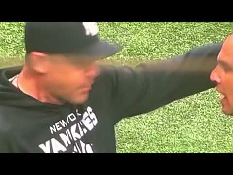 Aaron Boone ejected by home plate umpire Vic Carapazza. Called catchers interference on foul ball
