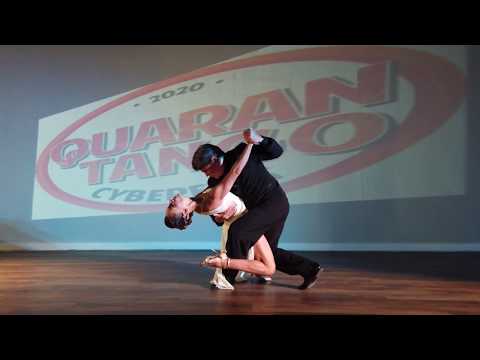  Alejandra Hobert  and  Adrian Veredice  are  dancing  to  the  tango  "  Oro Y Gris  "