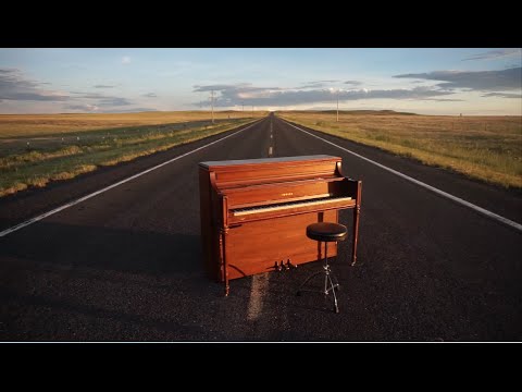 Piano in the middle of a New Mexico Desert road