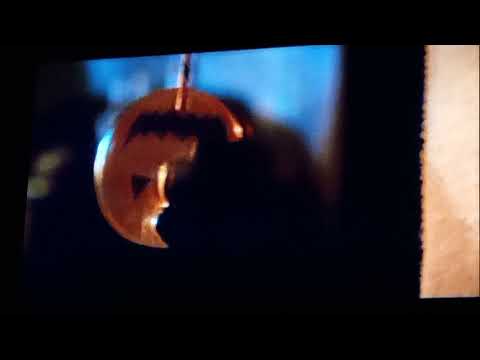 trick or treat Sam bites his pumpkin lollipop