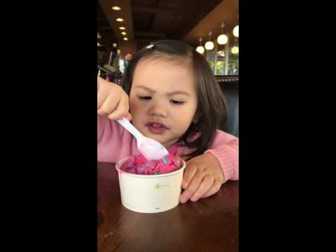 Toddler eating ice cream