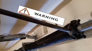WARNING! What a garage door spring can do if mishandled.