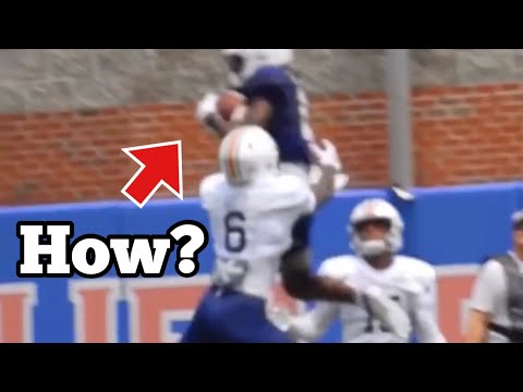 Auburn player Camden Brown floats while making catch for touchdown