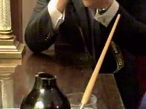 How to open a very old bottle of wine with red-hot tongs