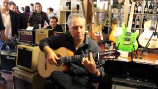 1. Il Maestro Francesco Buzzurro suona la chitarra fatta a mano dal Liutaio Giovanni Ingallinera.