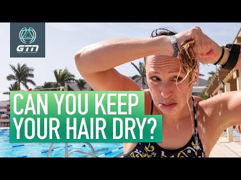 YouTube video about: Does a swim cap keep your hair dry?