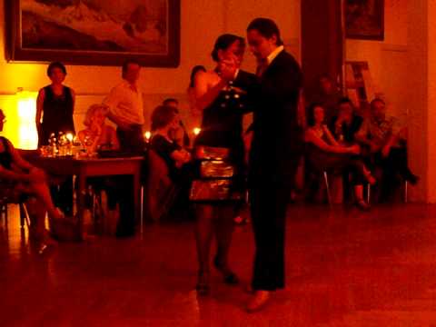  David Alejandro Palo  and  Milena Plebs  are  dancing  to  the  tango  "  Mensaje  "