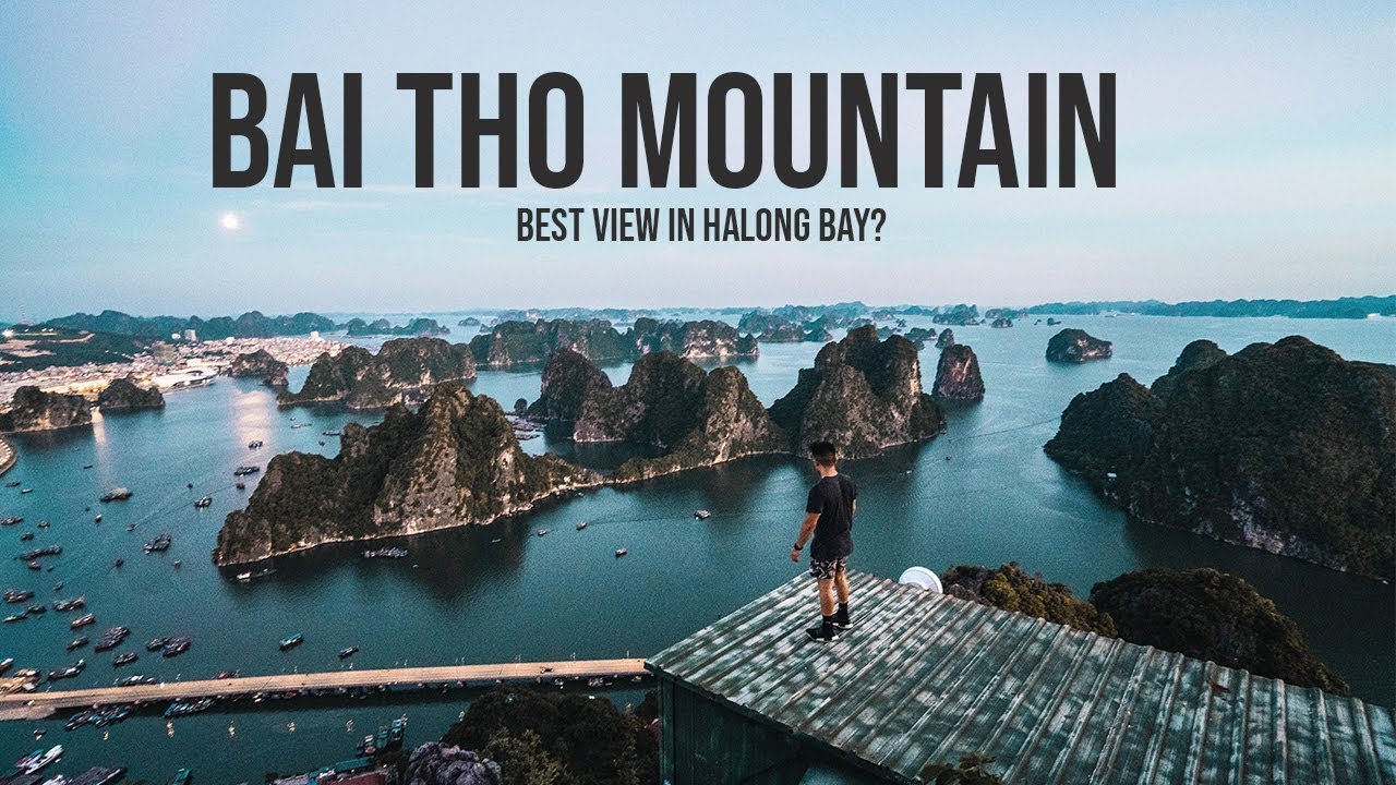 Witness the magical sunrise casting golden hues over the iconic bay from Bai Tho’s peak.