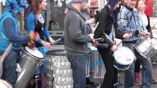 Drummers outside Code Hair Stylists