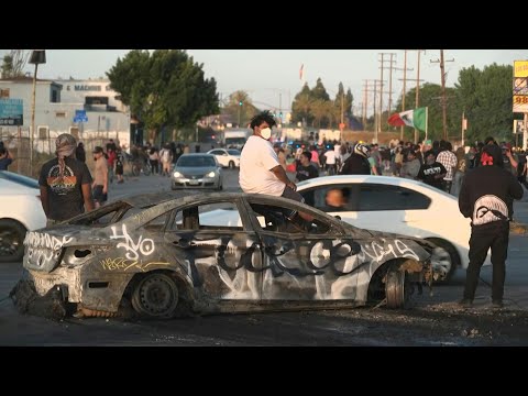 US demonstrators protest immigration enforcement raids in Los Angeles suburb | AFP