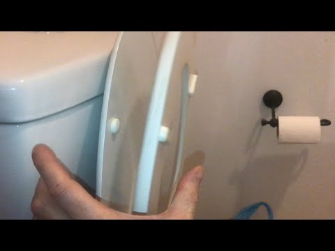 Part of a video titled fixing a toilet seat that FALLS DOWN (easy fix) - YouTube