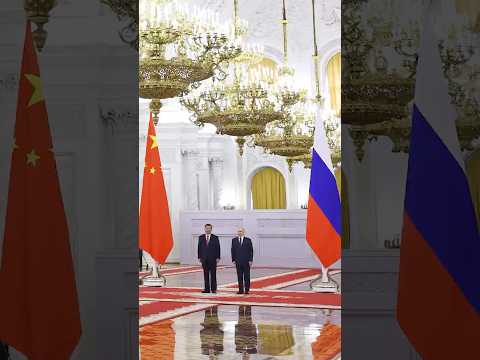 Putin Welcomes China's Xi to Kremlin for State Visit