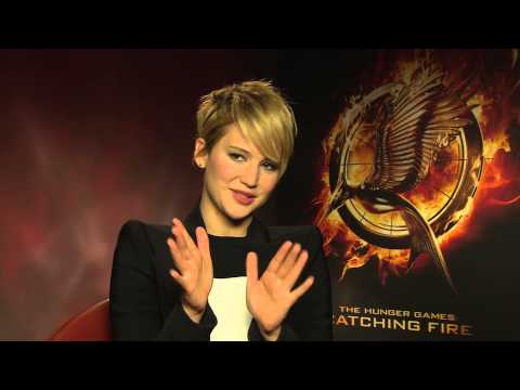 Jetlagged Jennifer Lawrence nearly falls asleep during Hunger Games Catching Fire junket interview