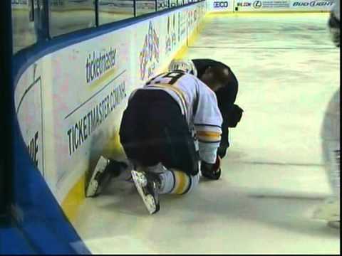 Nate Thompson incidentally destroys Tim Connolly