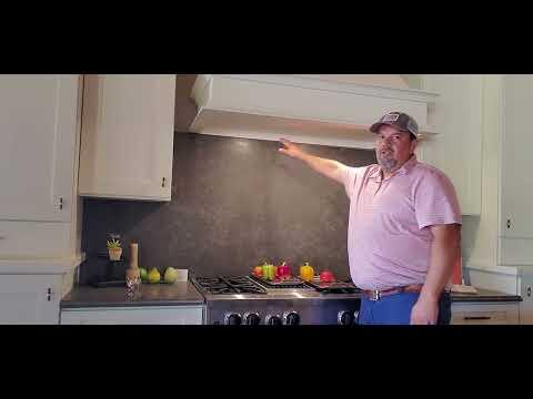 What Height should I install the hood over the cooktop/ range?