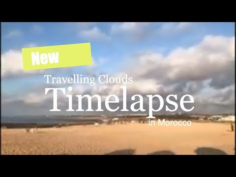 Time lapse - travelling low altitude clouds on a beach in Morocco