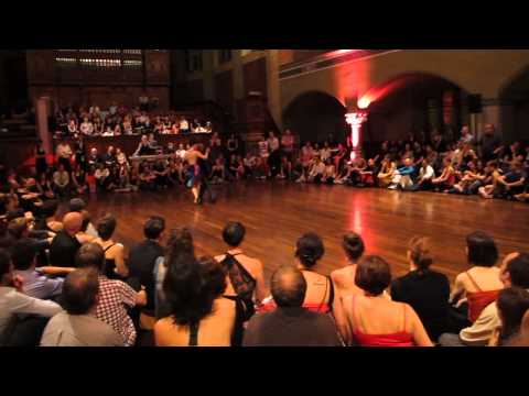  Mariano Frumboli  and  Juana Sepulveda  are  dancing  to  "  Los Diablos Rojos  "  by  Héctor Varela  at  Festivalito Tango Primavera  in  2014