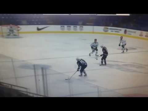 Eemeli Räsänen throws a hit on Riley Tufte