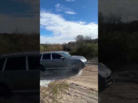 Porsche Cayenne S 955 crossing the Conlara River in Concarán - San Luis, Argentina