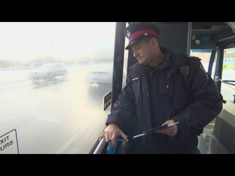 Police ride buses to ambush texting drivers