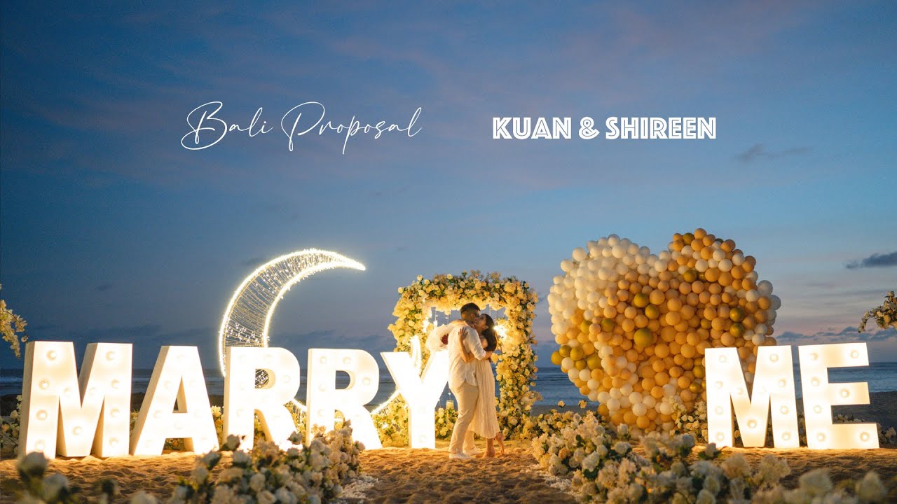 Video thumbnail: Kuan and Shireen, giant Marry Me letters and a crescent moon at dusk