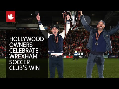 Ryan Reynolds and Rob McElhenney celebrate Wrexham's win