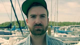 Sitting on a Boat - RILEY MOORE