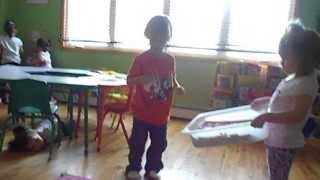 Daniel W. in nursery, clean up time