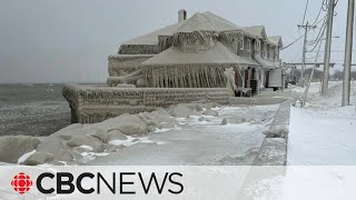 Massive storm kills at least 34 in U.S., Buffalo slammed with massive snow drifts