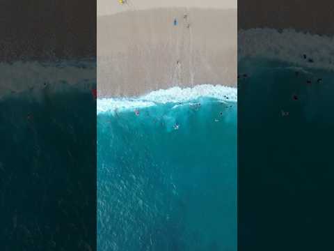 Guy swept away by MASSIVE rip current😱 #shorts #ripcurrent #waves #riptide