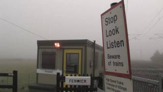 preview picture of video 'Trains passing Fenwick Level Crossing'