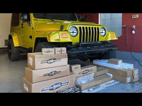 Rubicon express 4” Lift kit installing on a jeep