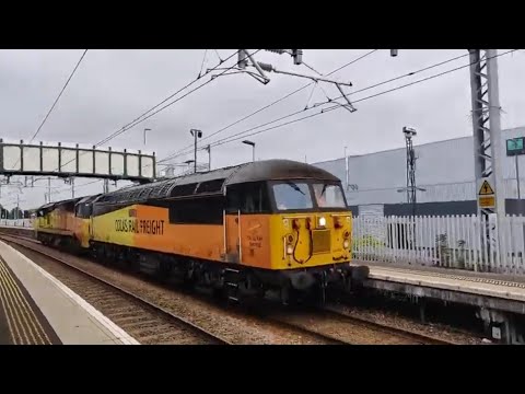 Colas 56302 and 70810 pass Camelon