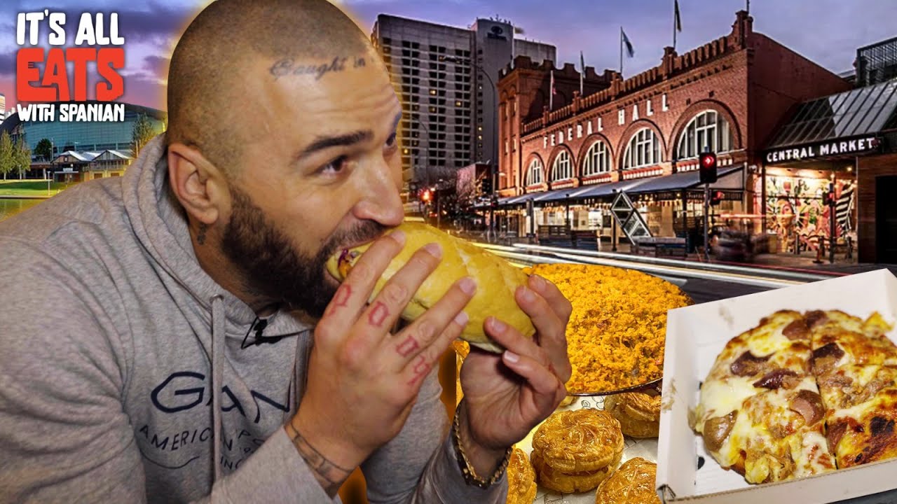 An adventurer explores diverse cuisines at Adelaide Central Market.