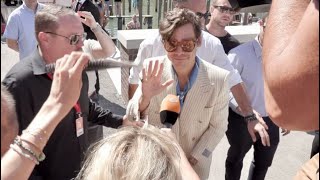 The crowd goes wild as Harry Styles promotes his latest movie at the Venice Film Festival