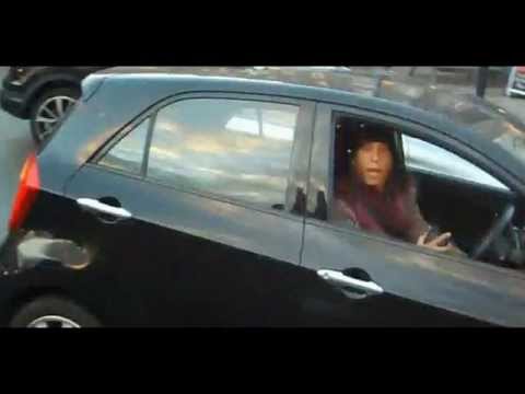 LX61 ZLN - caught on phone: "Mind your business, yeah." 20150326