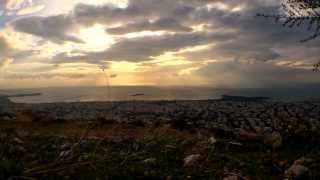 preview picture of video 'Greece Glyfada Hill - Cloudy SunRise (TimeLapse) 28.12.2013'