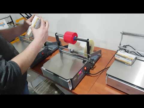 Manual cellophane wrapping machine